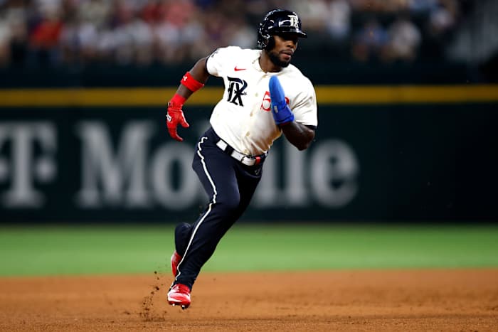 Sep 2, 2023; Arlington, Texas, USA; Texas Rangers left fielder J.P. Martinez (50) runs to third base in the fourth inning against the Minnesota Twins at Globe Life Field.